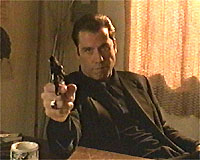 John Travolta as Chili Palmer in Get Shorty